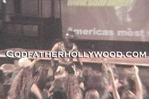 Hollywood at the male strip club performing his cowboy and driving the latin women crazy.